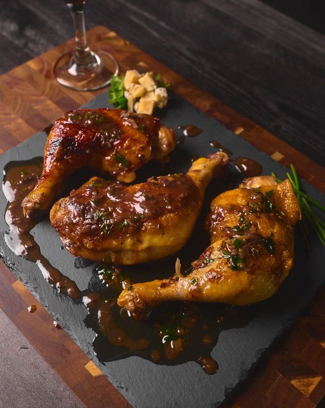 Glazed chicken on slate