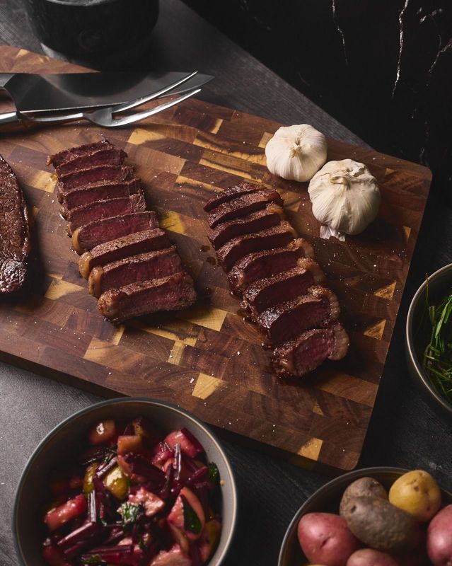 Sliced steak on the board