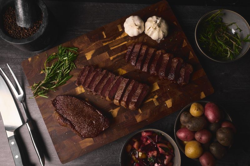 Steak, herbs and potatoes